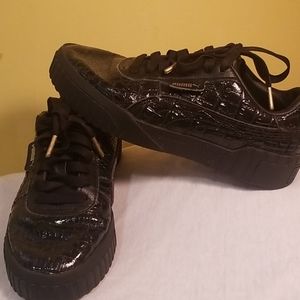 Black Puma sneakers